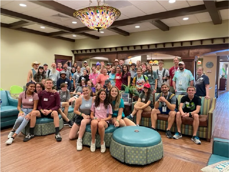 Another group of New Hope for Kids volunteers posing together to support children and families in need