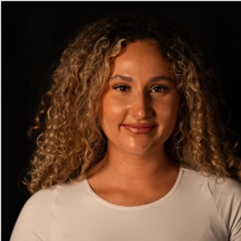 Portrait of Kaelyn Delisser, Media Specialist at New Hope for Kids